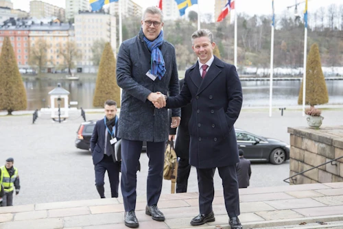 Pål Jonson, the Swedish defence minister, welcomes Bjarni Benediktsson, foreign minister of Iceland, to Stockholm.