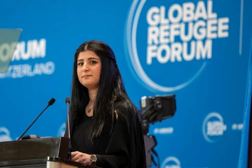 Aya Mohammed Abdullah fyrrverandi flóttamaður sem nú býr í Sviss ávarpaði þátttakendur á ráðstefnunni í Genf. Ljósmynd: UNHCR.